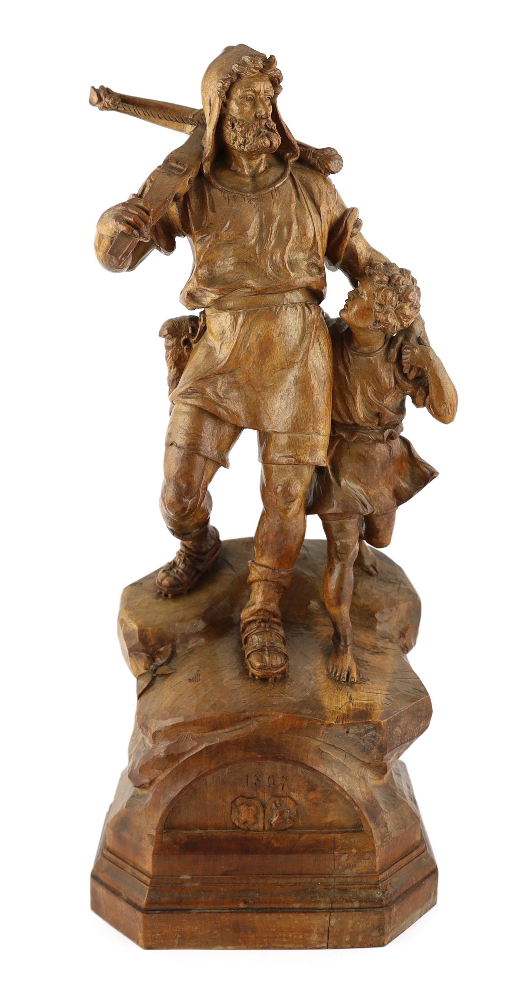 Jacob Abplanalp of Grindelwald, a carved group of William Tell and his son, 30cm high, 26cm deep, 71cm high